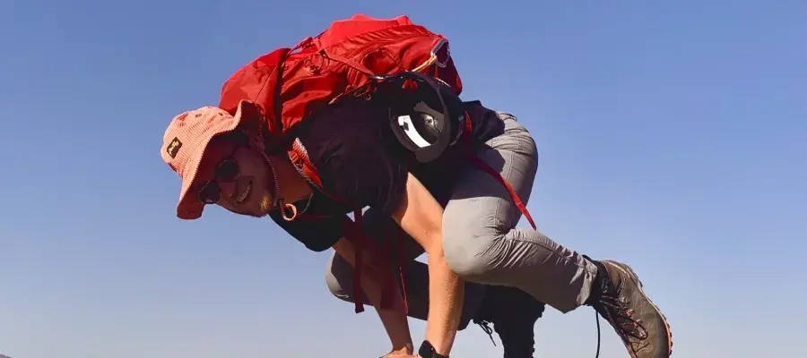 Torin practising yoga on fieldwork