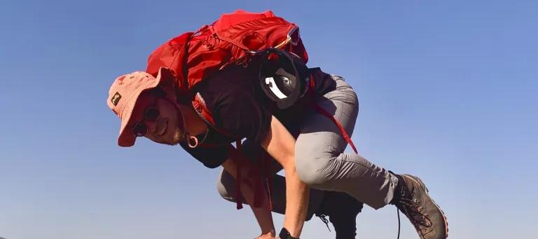 Torin practising yoga on fieldwork