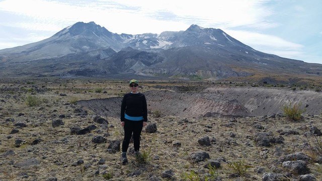 Amelia Bain with Mount St Helens in the background, USA (photo A.Bain)